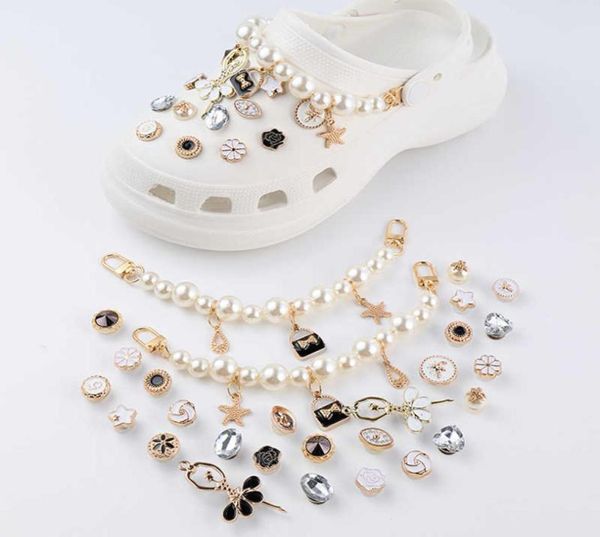 luxury rhinestones charms designer diy pearl chain shoes decaration for croc jibbi clogs kids boys women girls gifts6396183, Bronze;silver
luxury rhinestones charms designer diy pearl chain shoes decaration for croc jibbi clogs kids boys women girls gifts6396183, Bronze;silver