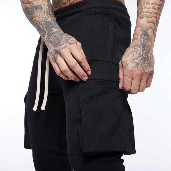 men's pants autumn new men's jogging pants cotton pocket design running freight pants gym men's fitness multi pocket style tr, Black
men's pants autumn new men's jogging pants cotton pocket design running freight pants gym men's fitness multi pocket style tr, Black