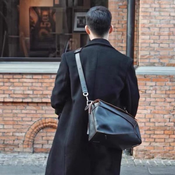 loeve puzzle edge travel handbag 10a men designer bags high capacity lychee pattern leather shoulder crossbody bag geometric handcraft stitc
loeve puzzle edge travel handbag 10a men designer bags high capacity lychee pattern leather shoulder crossbody bag geometric handcraft stitc