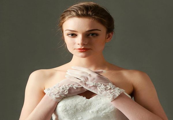 short white ivory tulle wedding gloves wrist length lace appliqued beaded woman bridal party sheer gloves guantes transparentes8742669
short white ivory tulle wedding gloves wrist length lace appliqued beaded woman bridal party sheer gloves guantes transparentes8742669