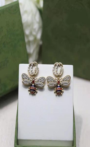 2021 new fashion charm pearl little bee pendant earring ladies gift wedding party jewelry with box2740200, Golden
2021 new fashion charm pearl little bee pendant earring ladies gift wedding party jewelry with box2740200, Golden