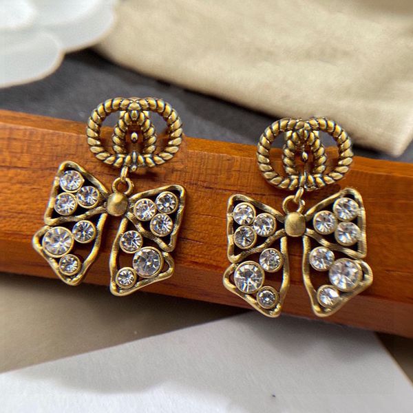 fashion double letter dangle pearl stud earrings bee butterfly aretes 925 silver needle brand designer earrings women party wedding annivers
fashion double letter dangle pearl stud earrings bee butterfly aretes 925 silver needle brand designer earrings women party wedding annivers