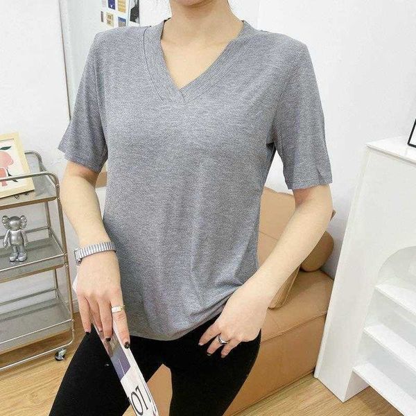 womens short sleeved summer thin shirt v neck t loose inner wear slimming, White
womens short sleeved summer thin shirt v neck t loose inner wear slimming, White
