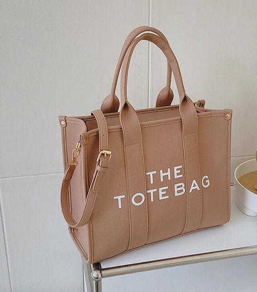 pu leather marc fashion handbags bag with logo large capacity shoulder for women wallets letter printed tote bag multi colors totes purse da, Black;red
pu leather marc fashion handbags bag with logo large capacity shoulder for women wallets letter printed tote bag multi colors totes purse da, Black;red