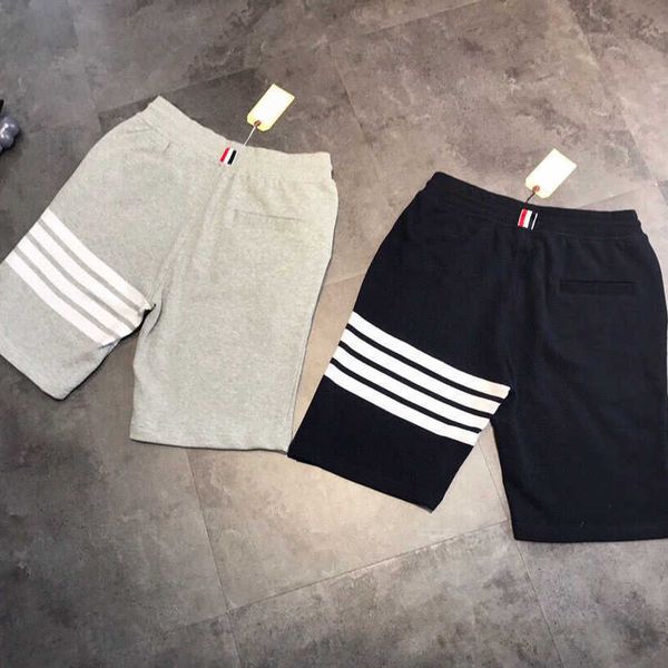 men's and women's shorts in 2023 summer new fashion designer brand thom trendy yarn dyed cotton versatile casual sports pants five, White;black
men's and women's shorts in 2023 summer new fashion designer brand thom trendy yarn dyed cotton versatile casual sports pants five, White;black