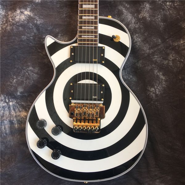 wholesale black and white circle custom left hand guitar with gold vibrato electric guitar
wholesale black and white circle custom left hand guitar with gold vibrato electric guitar