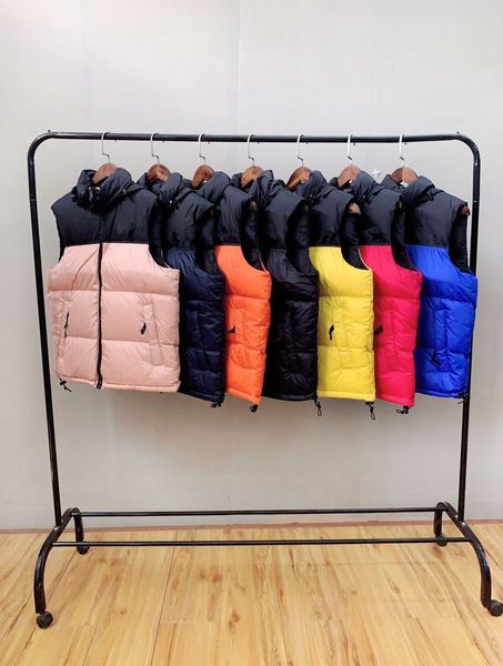 mens womens winter fashion men vest jackets coat men designer zipper coats outdoor warm feather outwear vests big size, Black;white
mens womens winter fashion men vest jackets coat men designer zipper coats outdoor warm feather outwear vests big size, Black;white