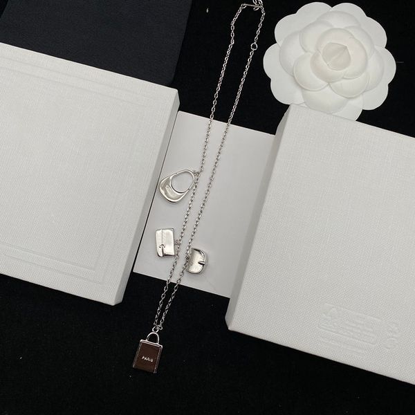 popular designer bag pendant necklace clavicle chain classic silver handbag charm bracelet for women wedding party jewelry gift
popular designer bag pendant necklace clavicle chain classic silver handbag charm bracelet for women wedding party jewelry gift