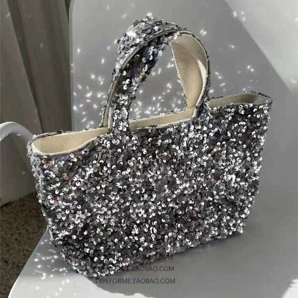 2023 new summer korean niche design modern silver gray series bling sequins handmade short handle canvas bag 230401
2023 new summer korean niche design modern silver gray series bling sequins handmade short handle canvas bag 230401