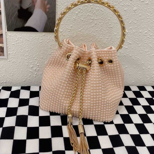 full diamond hand inlaid diamond ceramic beads bucket bag metal sequin tassel shiny candy color handbag female 230401
full diamond hand inlaid diamond ceramic beads bucket bag metal sequin tassel shiny candy color handbag female 230401