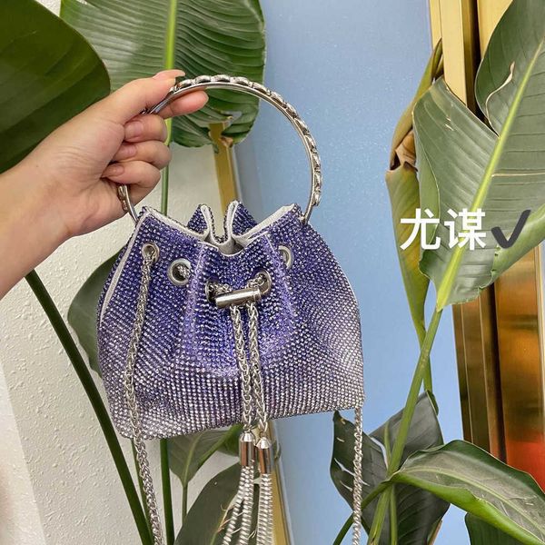 gradually shiny and inflexible blue tassel bucket bag metal rhinestone dinner party chain carrying messenger bag female 230401
gradually shiny and inflexible blue tassel bucket bag metal rhinestone dinner party chain carrying messenger bag female 230401