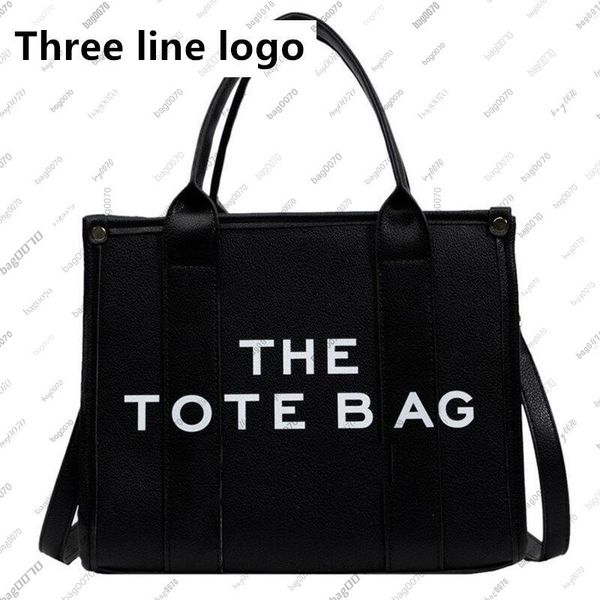 designer bag designer leather tote bag in marc jacobss style for luxurys premium cross body bag - comfortable shoulder strap and secure clos
designer bag designer leather tote bag in marc jacobss style for luxurys premium cross body bag - comfortable shoulder strap and secure clos