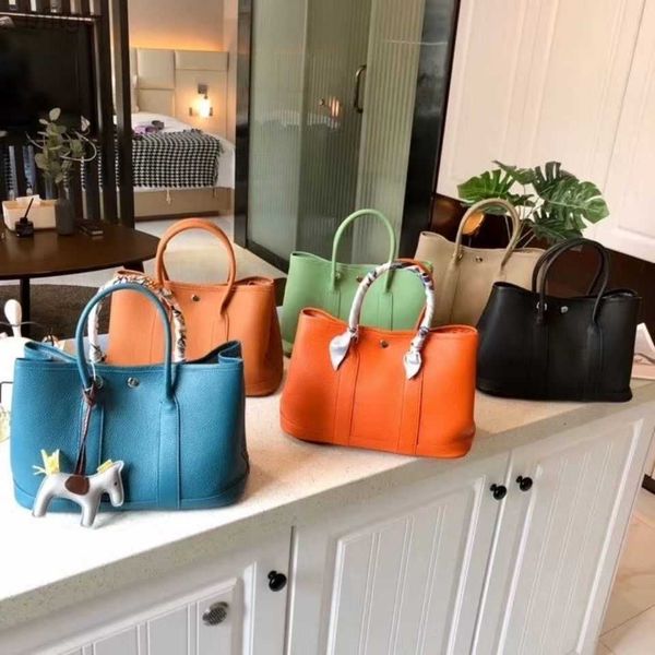 herms's designer garden party bags for women here comes the garden bag the age reducing and upscale design on back is suitable all fema
herms's designer garden party bags for women here comes the garden bag the age reducing and upscale design on back is suitable all fema