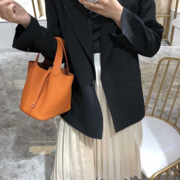 designer luxury bag color matching vegetable basket leather bucket lychee grain layer cowhide simple and versatile portable women's bag
designer luxury bag color matching vegetable basket leather bucket lychee grain layer cowhide simple and versatile portable women's bag