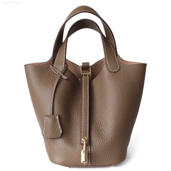 designer luxury bag the first layer of cowhide vegetable basket women's leather bucket commuting litchi pattern hand mother's bagg
designer luxury bag the first layer of cowhide vegetable basket women's leather bucket commuting litchi pattern hand mother's bagg
