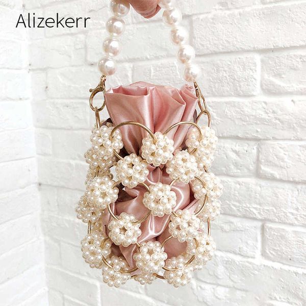 evening bag hollow pearl handbgs women new small beads clutch purses and handba
evening bag hollow pearl handbgs women new small beads clutch purses and handba