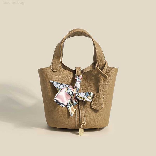 designer luxury fashion women's litchi pattern casual portable water bucket solid color vegetable basket bag silk scarf hanger handbag
designer luxury fashion women's litchi pattern casual portable water bucket solid color vegetable basket bag silk scarf hanger handbag