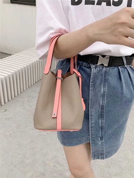 designer luxury vegetable basket layer cow leather bucket steamed bun mother celebrity style early contrast color matching portable bag tide
designer luxury vegetable basket layer cow leather bucket steamed bun mother celebrity style early contrast color matching portable bag tide
