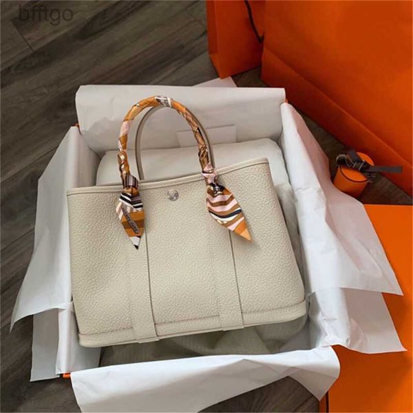 herms's designer garden party bags for women litchi grain layer cow leather garden bag with and large capacity single shoulder messenge
herms's designer garden party bags for women litchi grain layer cow leather garden bag with and large capacity single shoulder messenge