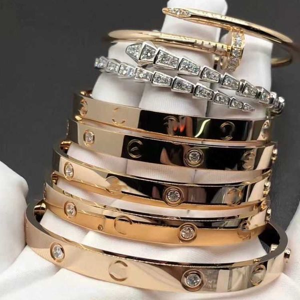 designer couple diamond gold 18k plated bracelet with screw stainless steel, Golden;silver
designer couple diamond gold 18k plated bracelet with screw stainless steel, Golden;silver