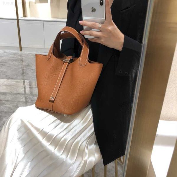 designer luxury bag color matching vegetable basket leather bucket lychee grain layer cowhide simple and versatile portable women's bag
designer luxury bag color matching vegetable basket leather bucket lychee grain layer cowhide simple and versatile portable women's bag
