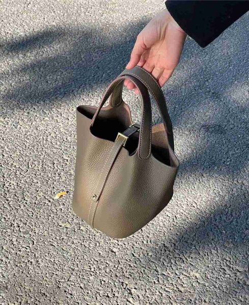 designer luxury bag color matching vegetable basket leather bucket lychee grain layer cowhide simple and versatile portable women's bag
designer luxury bag color matching vegetable basket leather bucket lychee grain layer cowhide simple and versatile portable women's bag