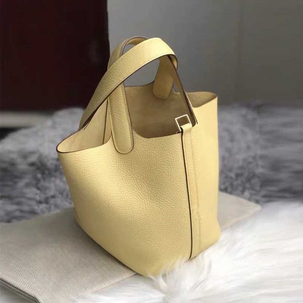 designer luxury bag color matching vegetable basket leather bucket lychee grain layer cowhide simple and versatile portable women's bag
designer luxury bag color matching vegetable basket leather bucket lychee grain layer cowhide simple and versatile portable women's bag