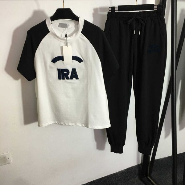 23ss womens tracksuits designer flocking embroidery letter color matching short sleeve t-shirt elastic waist binding feet casual pants set w, White
23ss womens tracksuits designer flocking embroidery letter color matching short sleeve t-shirt elastic waist binding feet casual pants set w, White