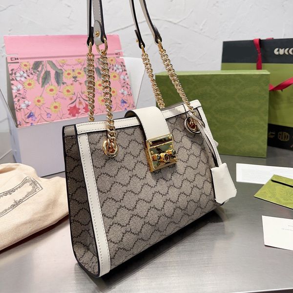 padlock 23ss designer bag shoulder bag luxurys hand bag fashion clutch even leather bag 7a 3 color 26cm
padlock 23ss designer bag shoulder bag luxurys hand bag fashion clutch even leather bag 7a 3 color 26cm