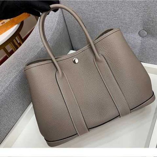 herms's designer garden party bags for women bag 2023 new leather women's large capacity bucket one shoulder portable tote wedding
herms's designer garden party bags for women bag 2023 new leather women's large capacity bucket one shoulder portable tote wedding