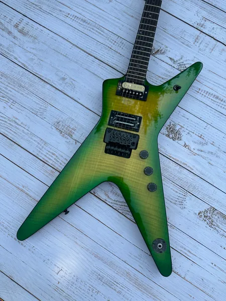 

Irregular electric guitar, black double shake, imported wood and paint, green tiger pattern, bright light, in stock, fast shipping