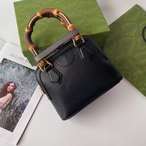 women genuine leather shell bags vintage mini bamboo handle bag with a leather strap in white/black colors gold hardware ladies crossbody ba
women genuine leather shell bags vintage mini bamboo handle bag with a leather strap in white/black colors gold hardware ladies crossbody ba