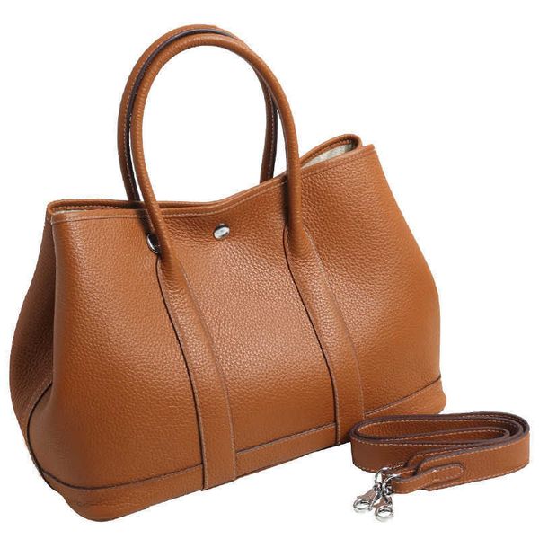 genuine leather garden bags for women women's handbag luxury designer tote crossbody shoulder bag with cowhide spaghetti straps
genuine leather garden bags for women women's handbag luxury designer tote crossbody shoulder bag with cowhide spaghetti straps