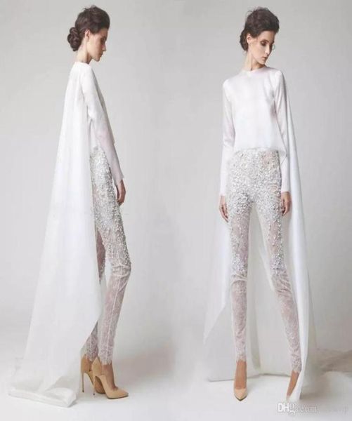 2022 white lace jumpsuits women prom dresses with cape pearls long sleeves evening dress pants fashion formal gowns vestido de fes3481044, Black;red
2022 white lace jumpsuits women prom dresses with cape pearls long sleeves evening dress pants fashion formal gowns vestido de fes3481044, Black;red