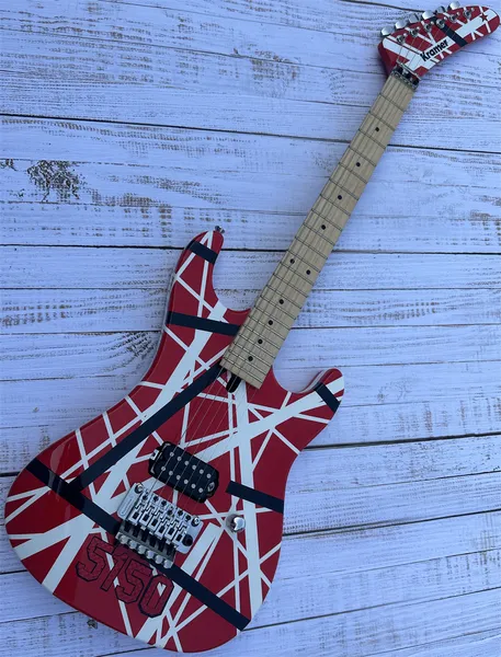

5150 electric guitar, imported alder body, Canadian maple fingerboard, signed, classic red and white stripes, lightning