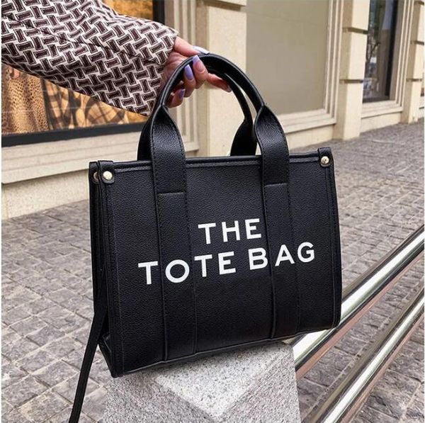 the tote bag women luxury designer bags pu leather practical large capacity plain handbags coin purse square wallets totes bag
the tote bag women luxury designer bags pu leather practical large capacity plain handbags coin purse square wallets totes bag
