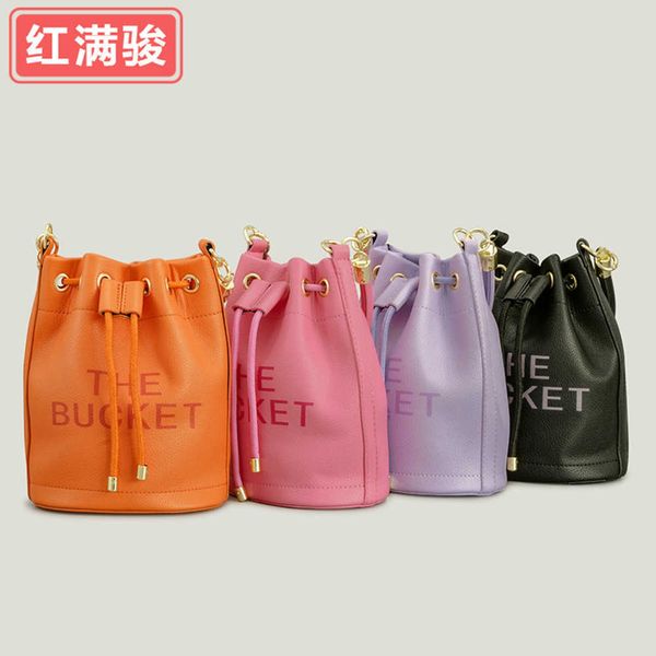 drawstring trend letter bucket bag pure color single shoulder diagonal straddle women's bag portable simple fashion tote bag 230406
drawstring trend letter bucket bag pure color single shoulder diagonal straddle women's bag portable simple fashion tote bag 230406