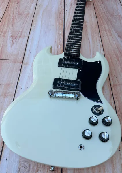 

SG electric guitar cream white, P90 pickup available in stock lightning package