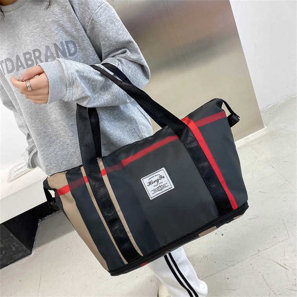 duffel bags 2023 new fashion folding short distance travel large capacity women s hand luggage storage wet and dry separation fitness 230406
duffel bags 2023 new fashion folding short distance travel large capacity women s hand luggage storage wet and dry separation fitness 230406