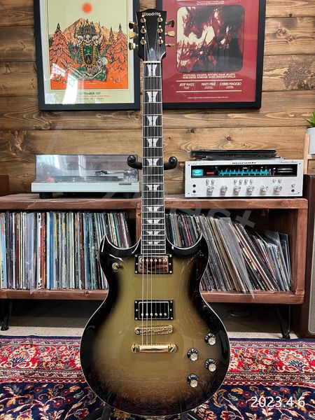 electric guitar gold burst mahognay body and neck rosewood fingerboard white pearl inlay chrome parts no pickguard
electric guitar gold burst mahognay body and neck rosewood fingerboard white pearl inlay chrome parts no pickguard