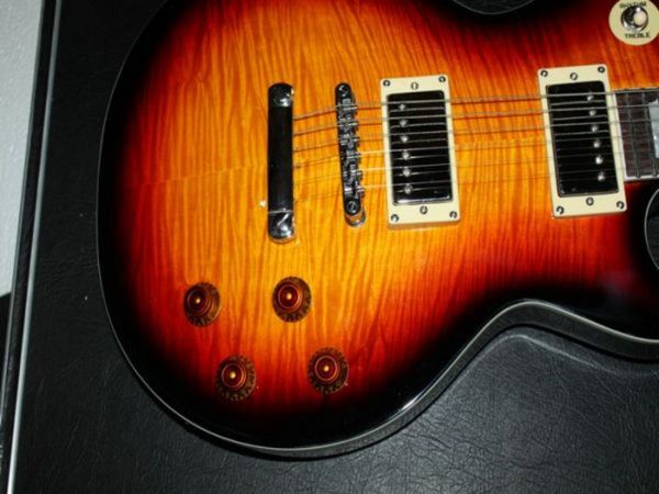 factory guitar new arrived cherry custom black red burst lp electric guitar oem available china
factory guitar new arrived cherry custom black red burst lp electric guitar oem available china
