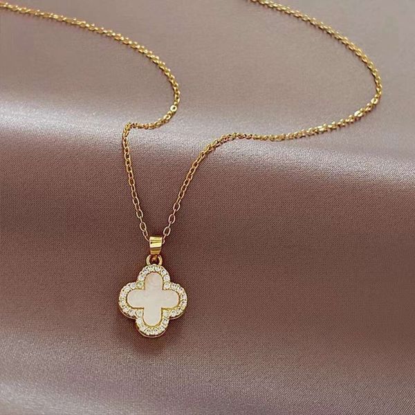 

Classic designer jewelry Four-leaf Clover Necklace jewelrys Women's High Edition Double Sided Diamond Necklaces Minimalist Temperament Clavicle Chain Van Clee