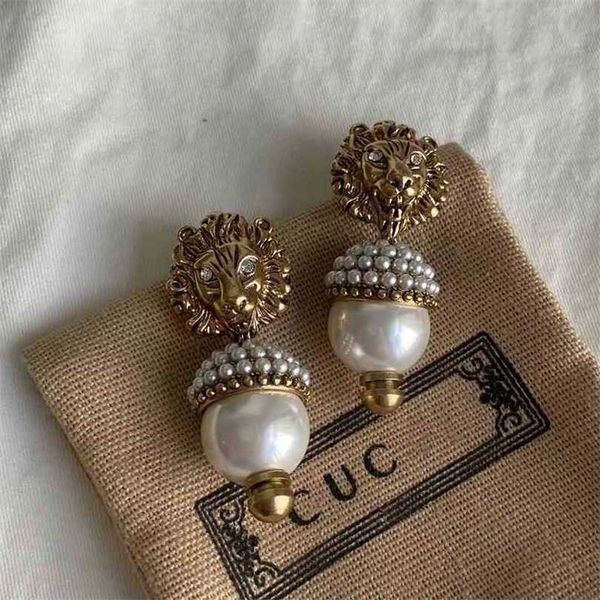 earrings 2023 new bronze lion head women's net red with fashionable and versatile pearl inlaid earrings factory direct sales 50% off, Golden
earrings 2023 new bronze lion head women's net red with fashionable and versatile pearl inlaid earrings factory direct sales 50% off, Golden