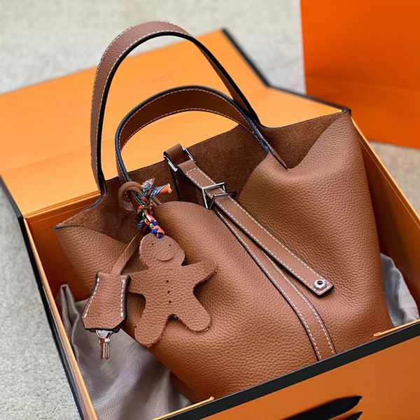 a designer tote bag her mas handbag women tote bag luxury brands vegetable large capacity multifunctional with silver lock and original dust
a designer tote bag her mas handbag women tote bag luxury brands vegetable large capacity multifunctional with silver lock and original dust