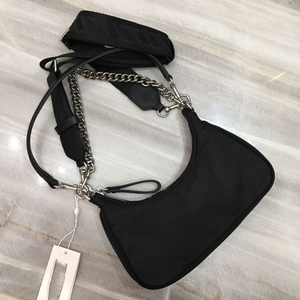 the crescent bag is made of nylon fabric material and comes with a small chain, shoulder straps, and wide shoulder straps, with three differ
the crescent bag is made of nylon fabric material and comes with a small chain, shoulder straps, and wide shoulder straps, with three differ
