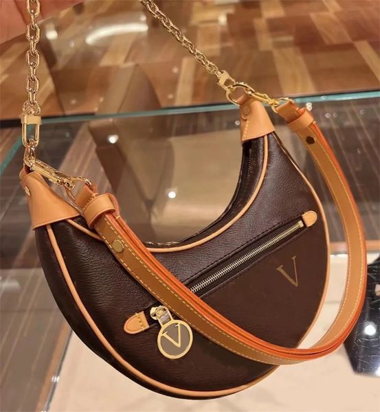 half moon shoulder bag baguette loop brown designer handbag for shopping showing sacoche external zipper design luxury handbags delicate mak
half moon shoulder bag baguette loop brown designer handbag for shopping showing sacoche external zipper design luxury handbags delicate mak