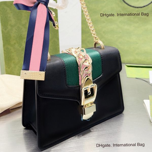 sylvie black taurus handbag cowhide crossbody shoulder bag with vintage classic style metal chain and colorful ribbons for decoration and ve
sylvie black taurus handbag cowhide crossbody shoulder bag with vintage classic style metal chain and colorful ribbons for decoration and ve