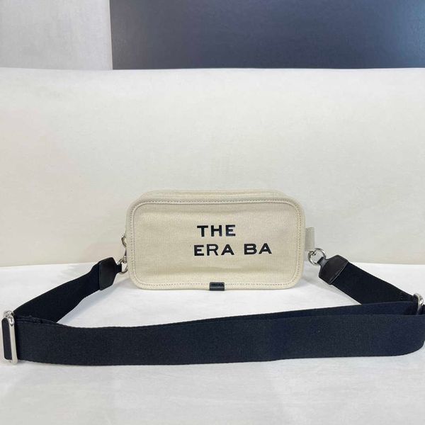 the tote bag women's angled camera bag canvas color with casual wide backstrap shoulder bag
the tote bag women's angled camera bag canvas color with casual wide backstrap shoulder bag