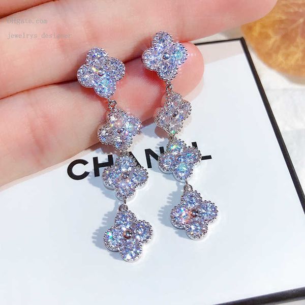 designer bracelets s925 silver long tassel stud 18k gold cubic zirconia four leaves flower earring wedding party earring fashion jewelry for, Golden;silver
designer bracelets s925 silver long tassel stud 18k gold cubic zirconia four leaves flower earring wedding party earring fashion jewelry for, Golden;silver