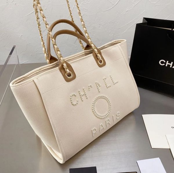 fashion women's luxury evening bags ch brand canvas handbag classic pearl beach hand bag designer female large backpack small packs por
fashion women's luxury evening bags ch brand canvas handbag classic pearl beach hand bag designer female large backpack small packs por